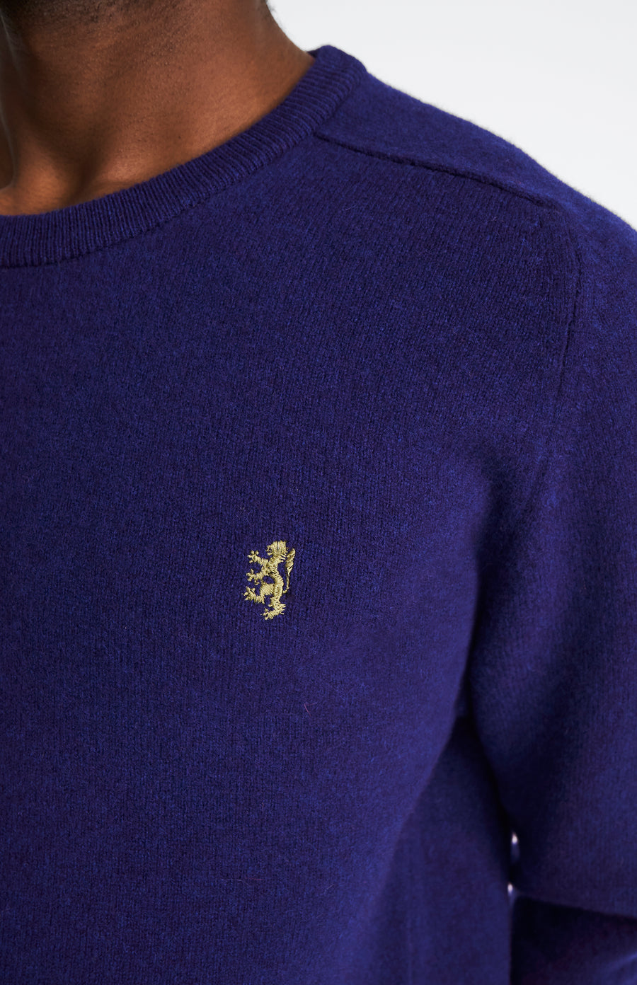 Pringle Round Neck Lion Lambswool Jumper In Royal Blue & Mineral Green showing embroidery