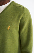 Pringle V Neck Lion Lambswool Jumper In Mineral Green & Mustard Sand showing embroidery