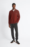 Knitted Lambswool Overshirt With Contrast Edging In In Rust Red & Cobble on model full length