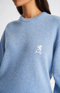 Pringle Women's Archive Round Neck Lambswool Jumper in Carolina Blue showing embroidery