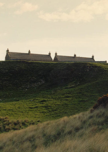 Discover our latest collections for men and women including our signature Scottish cashmere, iconic argyle, designer knitwear & luxurious loungewear. An image showing a Scottish landscape.