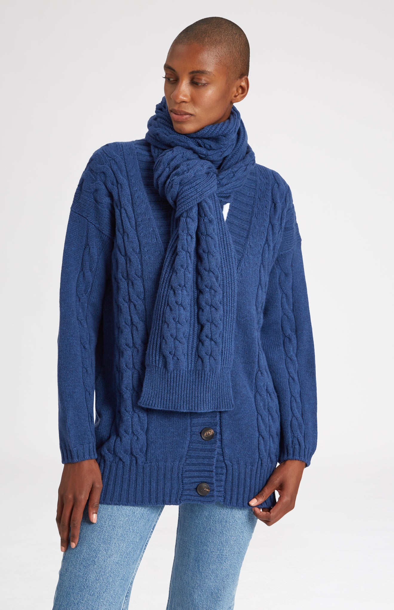 Rib and Cable Wool Scarf in Storm Blue on model - Pringle of Scotland