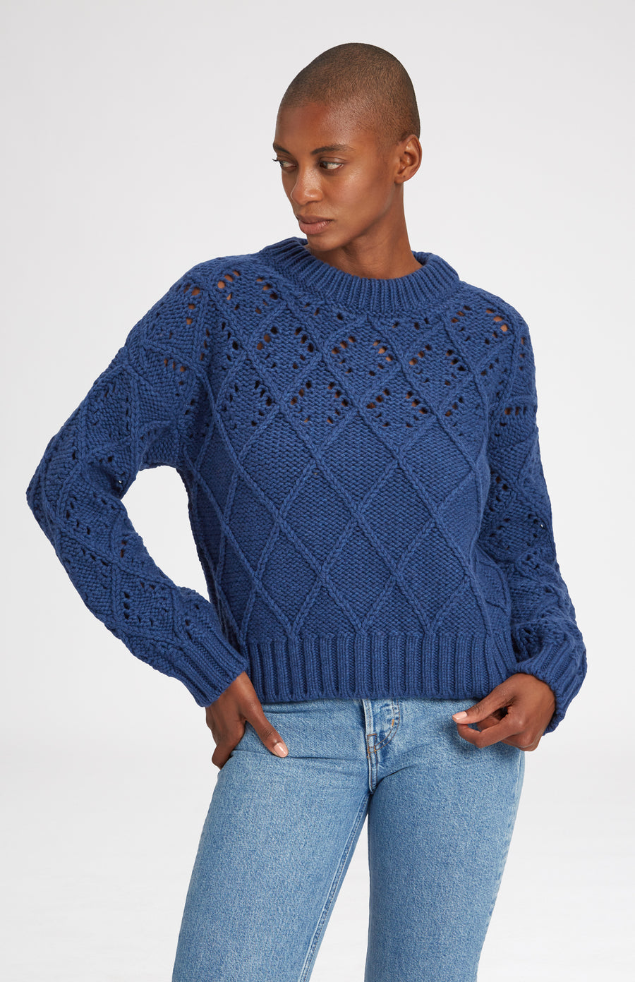 Women's Jumper with allover diamond pattern in Storm Blue on model - Pringle of Scotland