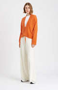 Pringle of Scotland Lightweight Cashmere Cardigan with Tie in Orange on model full length