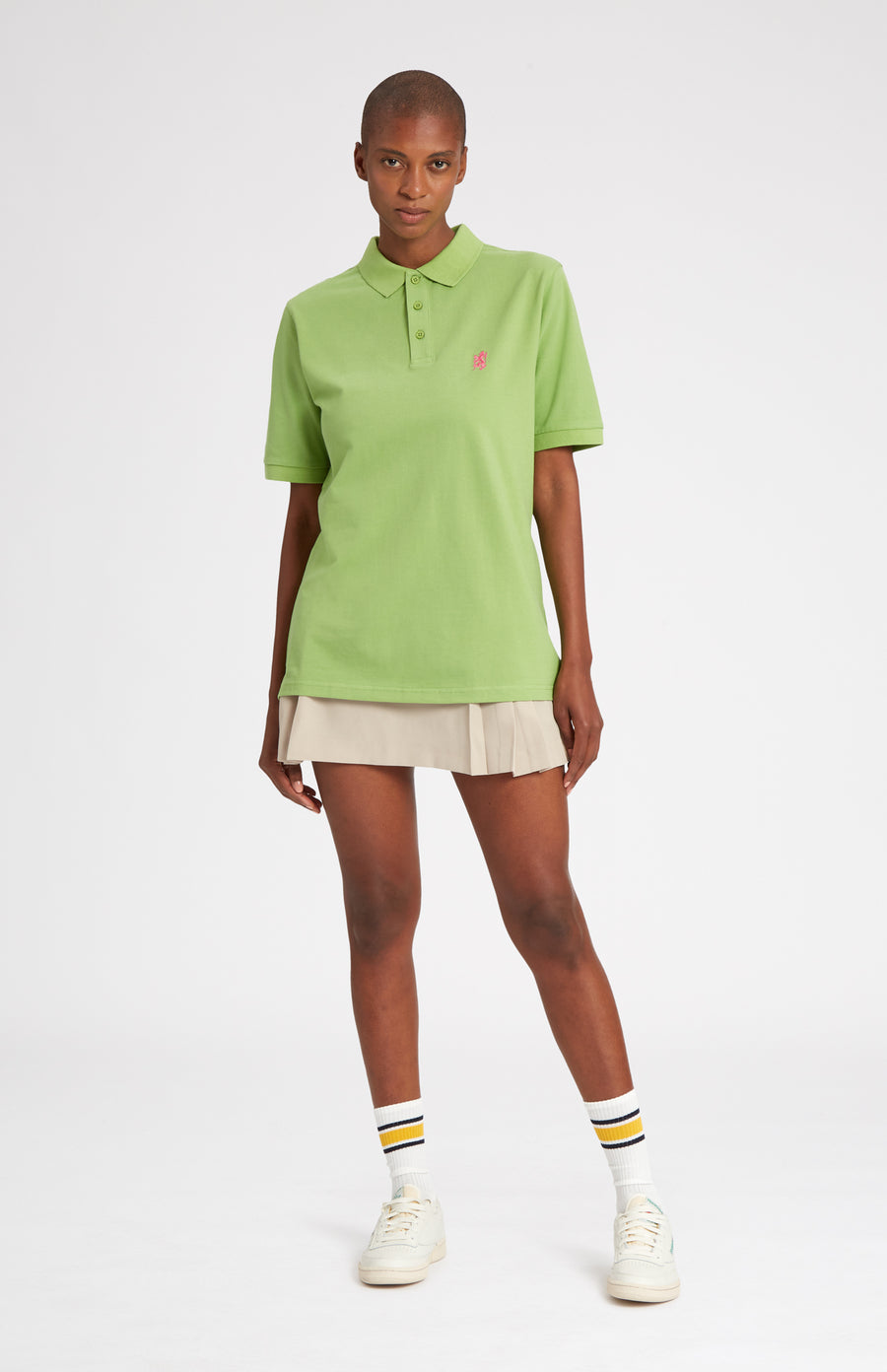 Cotton Heritage Golf Polo Shirt In Field Green on female model full length - Pringle of Scotland