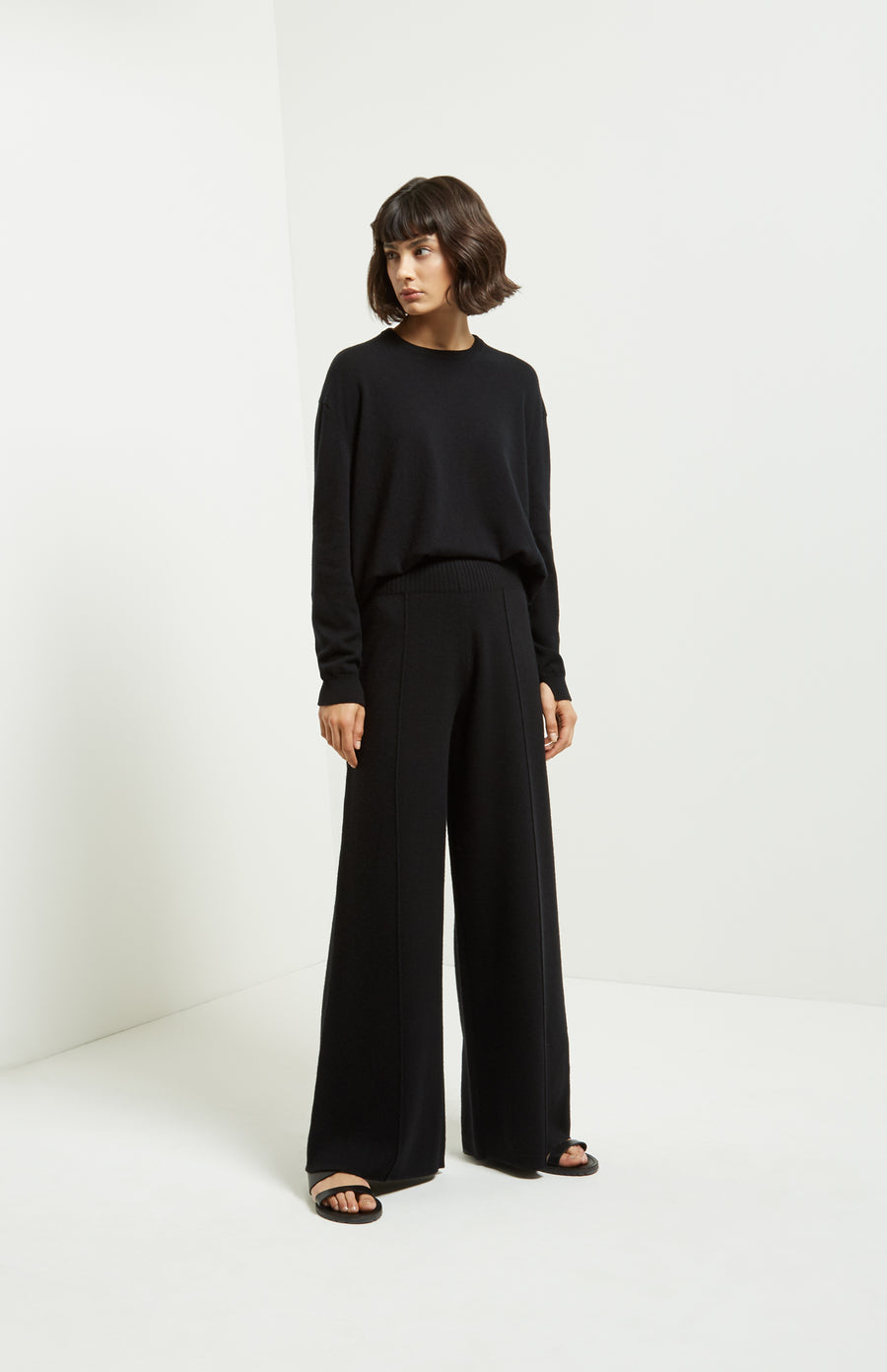 Knitted Wide Leg Cashmere Blend Trousers In Black on model - Pringle of Scotland