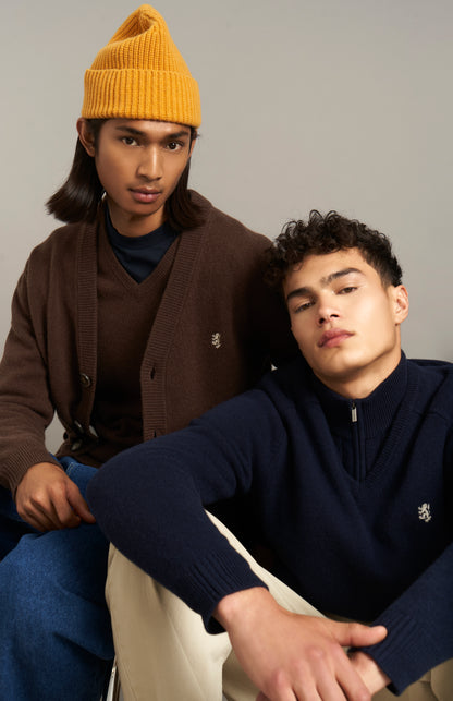 Pringle V Neck Lambswool Jumper in Midnight with Contrast Tipping lifestyle shot