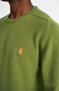 Pringle Round Neck Lion Lambswool Jumper In Mineral Green & Mustard showing embroidery