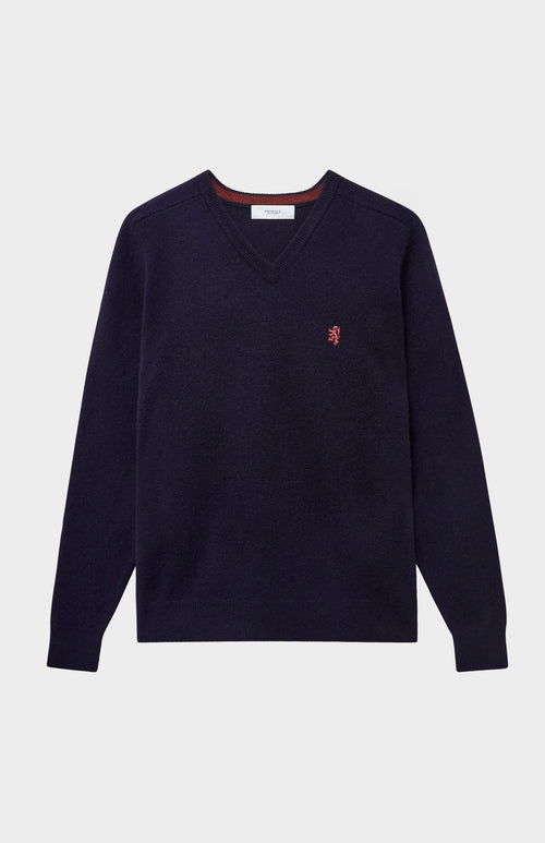 V Neck Lion Lambswool Jumper In Navy / Rust Red