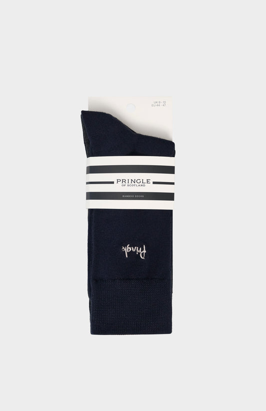 Navy socks with Pringle embroidery on a white background