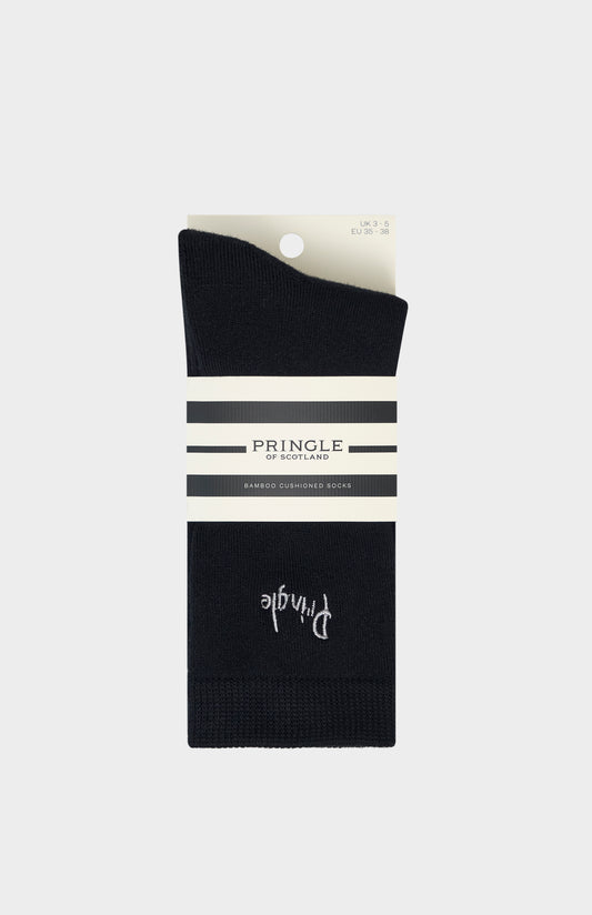 Black socks with Pringle branding in packaging on a white background
