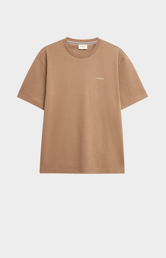 Beige t-shirt with a small logo on a light gray background