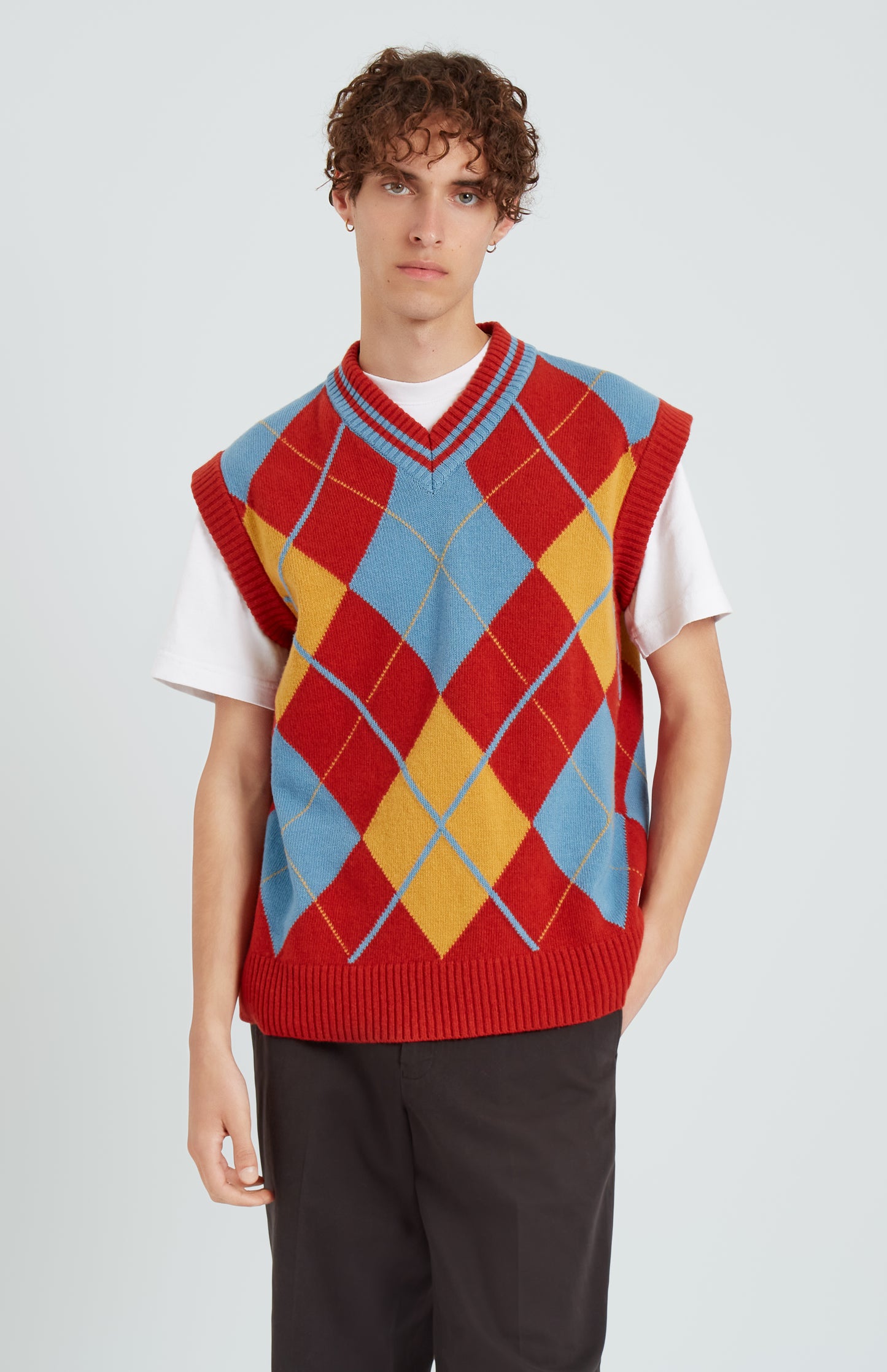 Pringle Lambswool Argyle V Neck Vest in Royal Blue & Rust Red on model