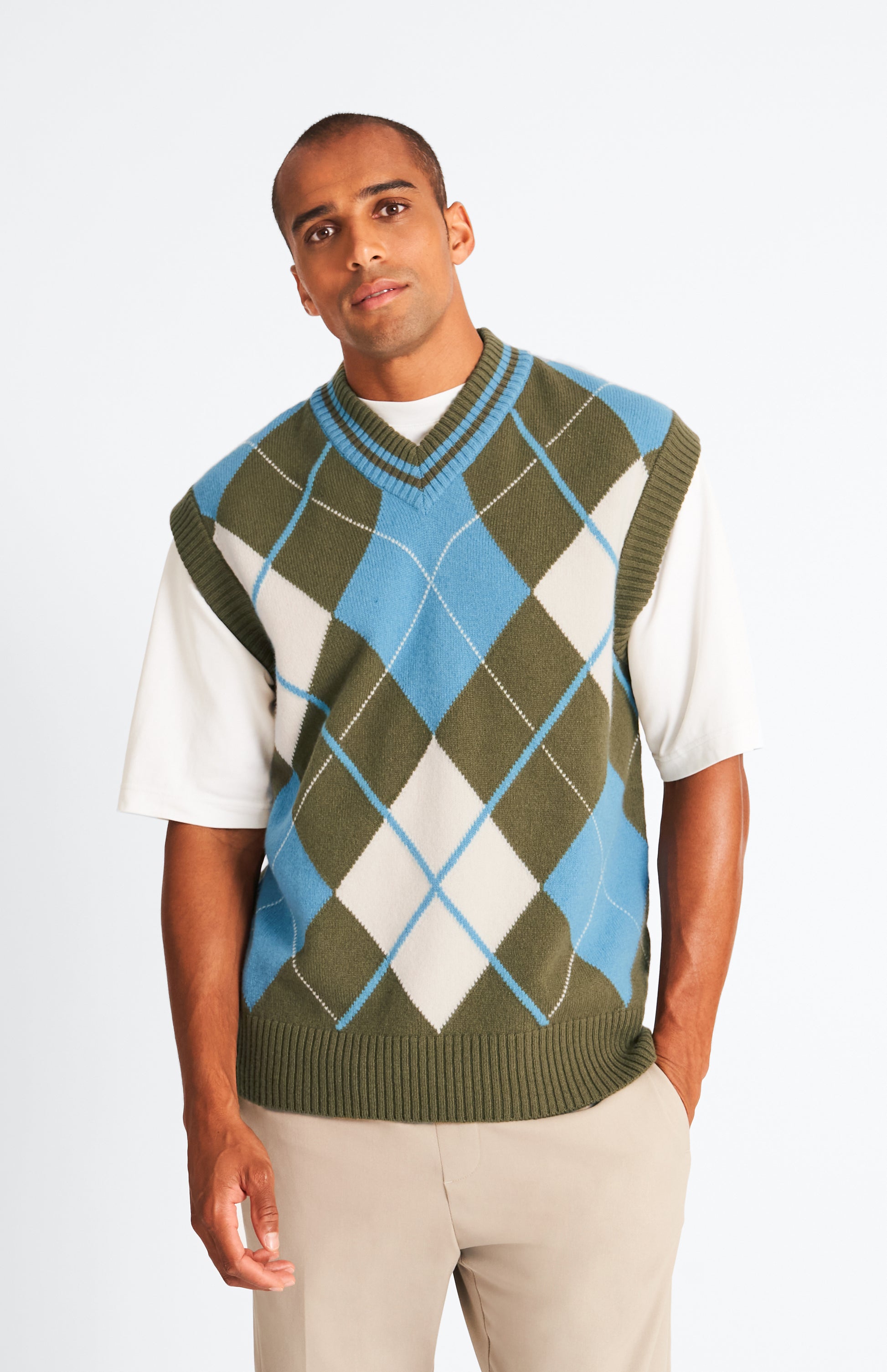 Pringle Lambswool Argyle V Neck Vest in Royal Blue & Mineral Green on model