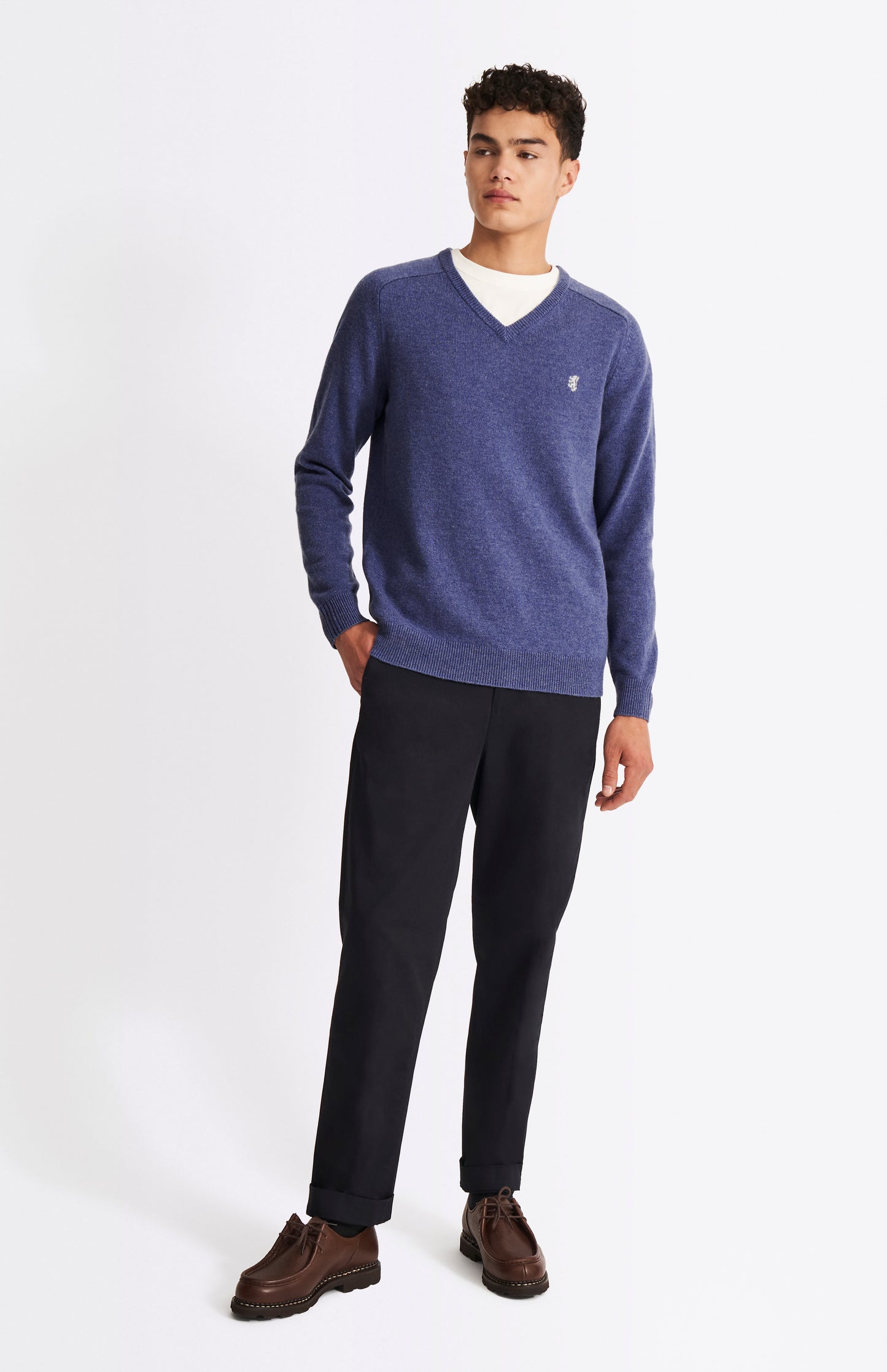 Pringle V Neck Lambswool Jumper in Dark Indigo with Contrast Tipping on model