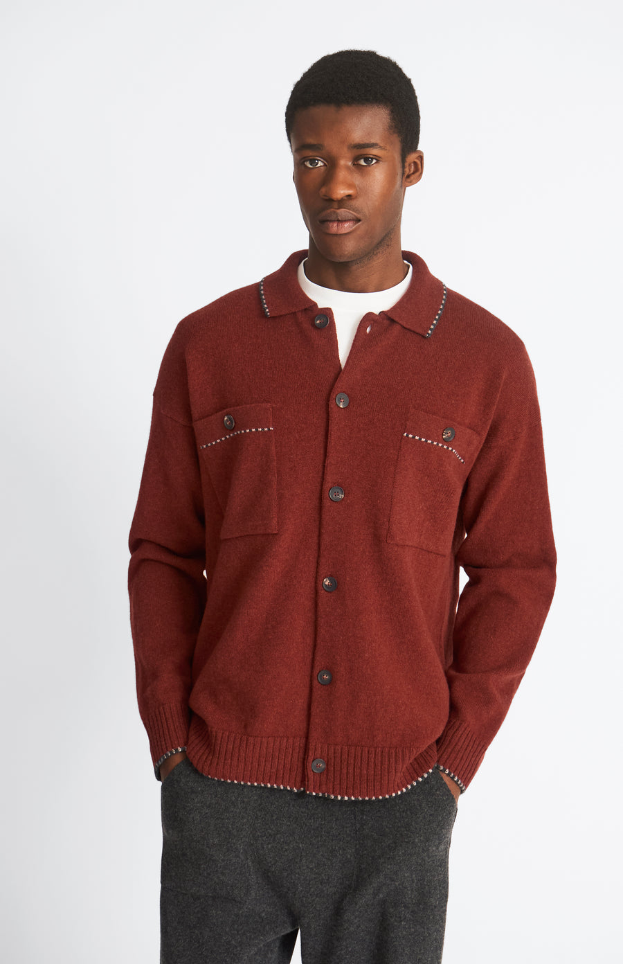 Knitted Lambswool Overshirt With Contrast Edging In In Rust Red & Cobble on model