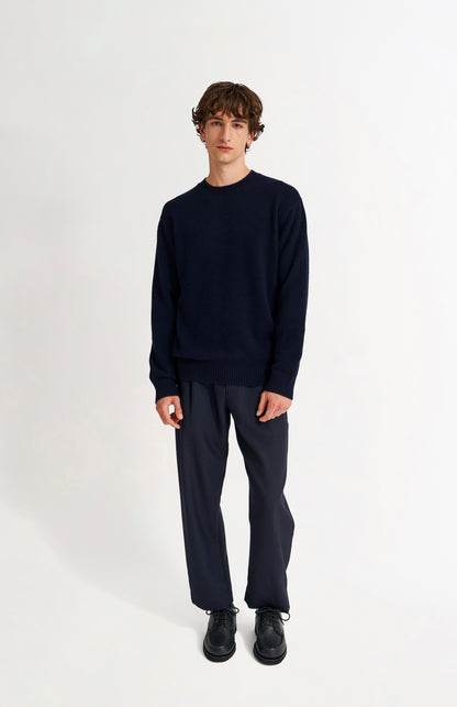 Pringle of Scotland Men's Round Neck Cashmere Jumper In Navy Melange on model full length