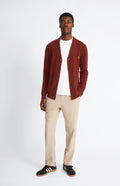 Pringle Men's lambswool V Neck Cardigan in Red Rust & Mineral Green unbuttoned on model