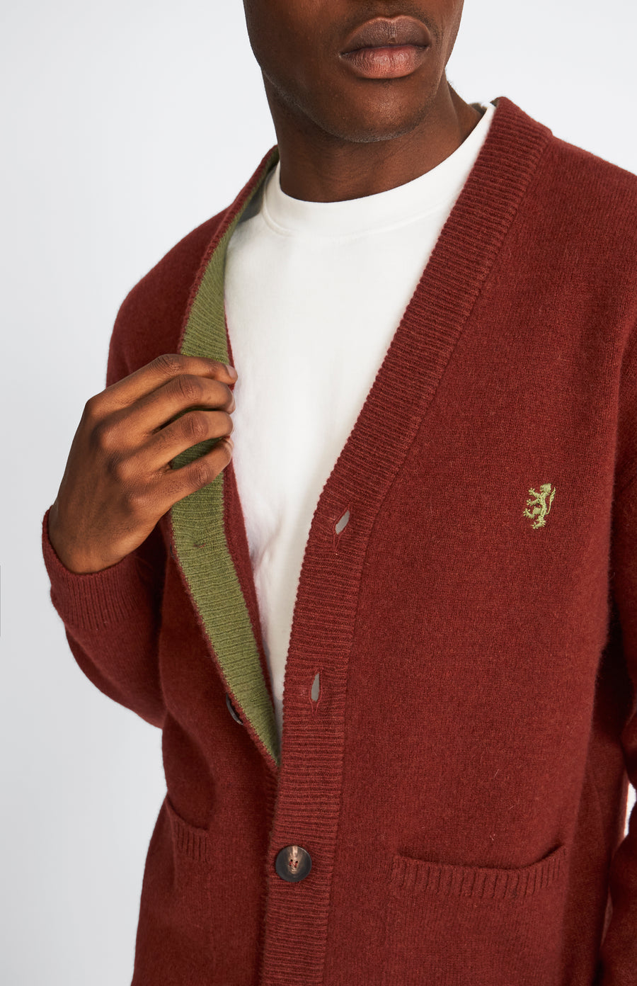 Pringle Men's lambswool V Neck Cardigan in Red Rust & Mineral Green showing contrast trims