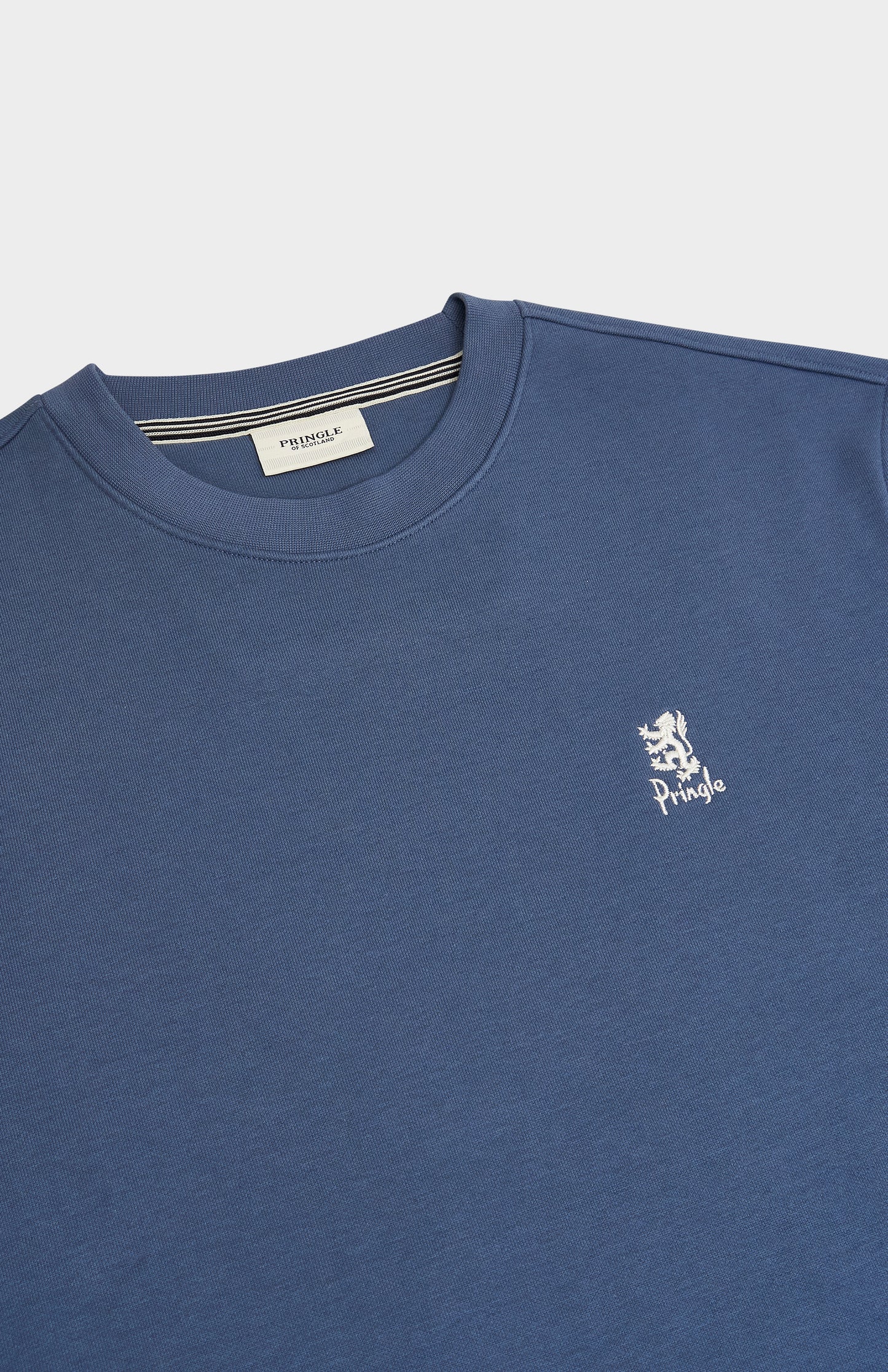 Pringle of Scotland Men's Crew Neck Sweatshirt In Bering Sea Blue showing embroidery