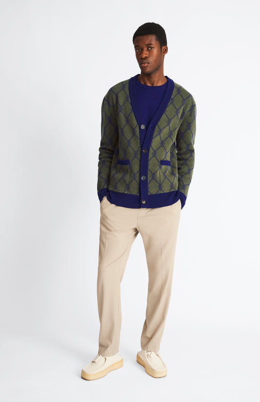 Pringle of Scotland monogram jacquard cardigan in Mineral Green / Royal Blue on model full length