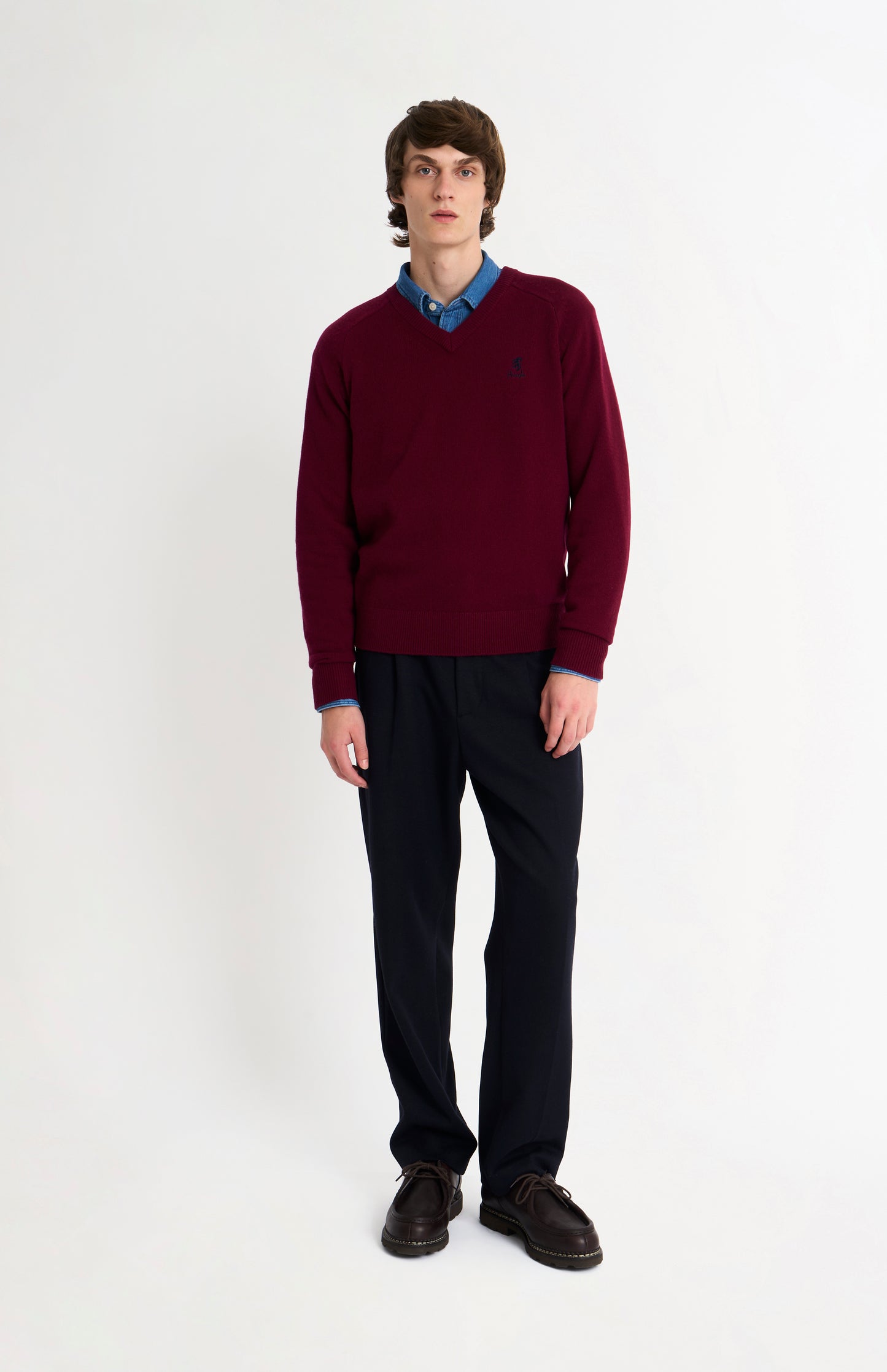 Pringle of Scotland Men’s Lambswool V Neck Jumper In Burgundy on model full length