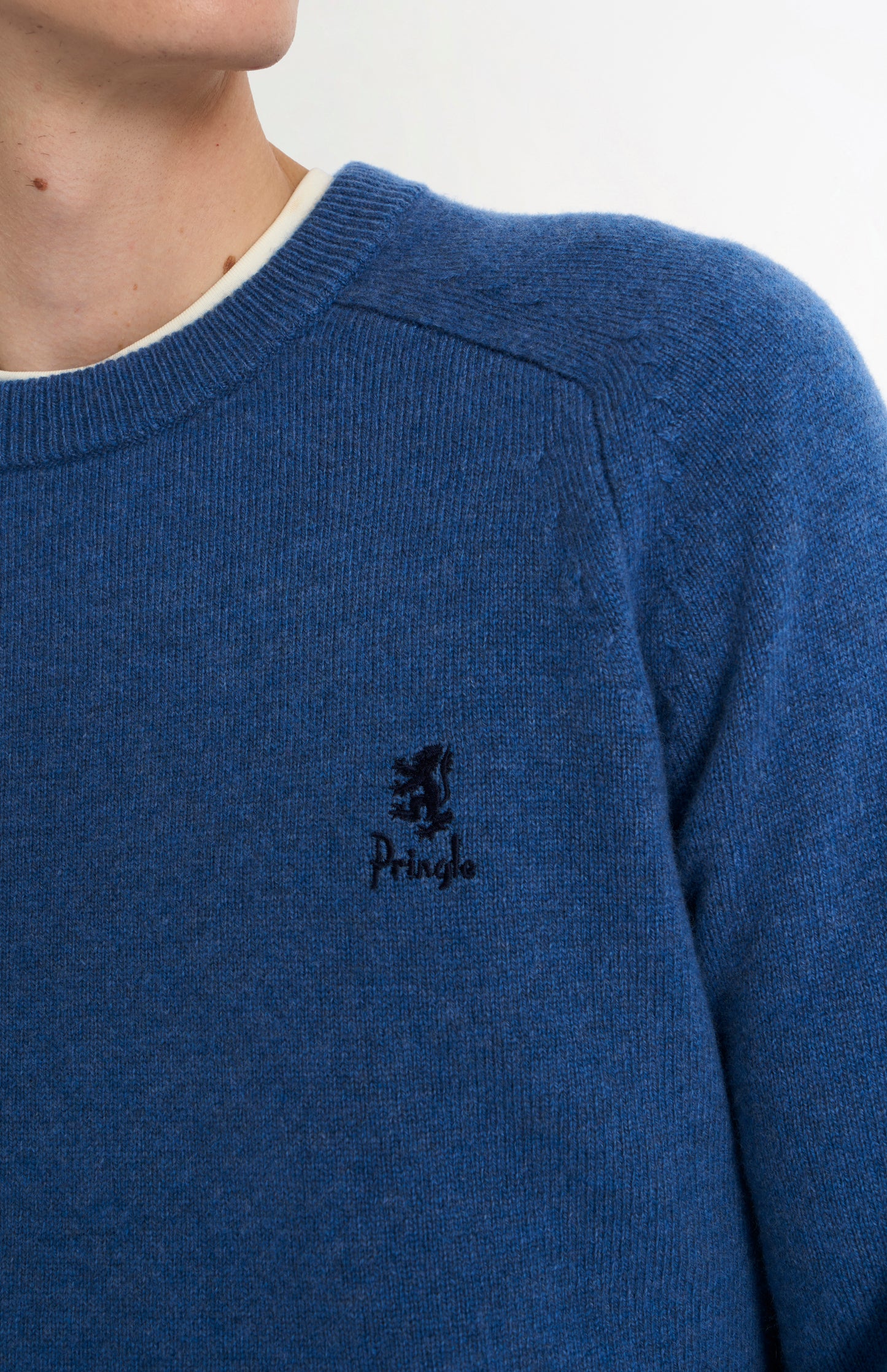 Pringle Men’s Lambswool Crew Neck Jumper In Bearing Sea Blue embroidery detail