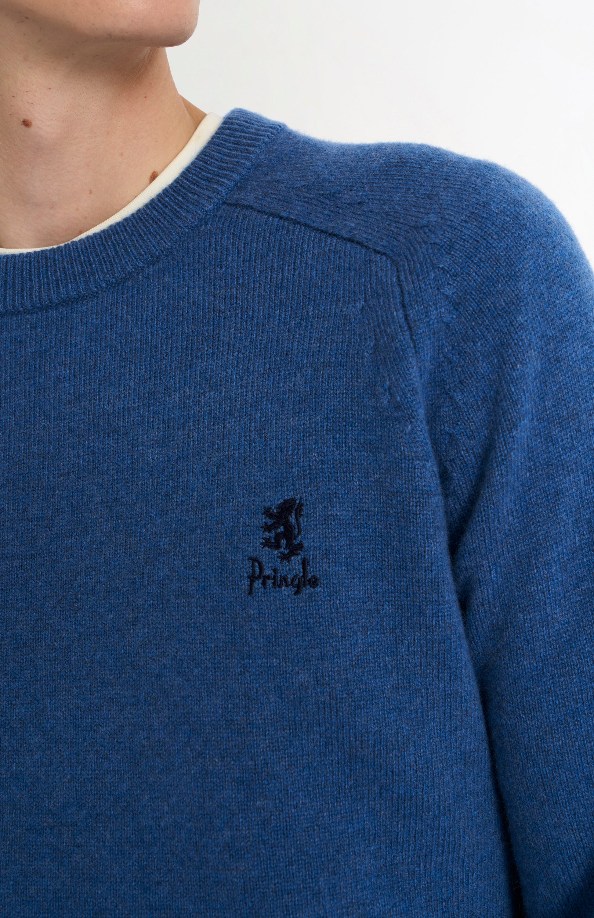 Pringle Men’s Lambswool Crew Neck Jumper In Bearing Sea Blue embroidery detail