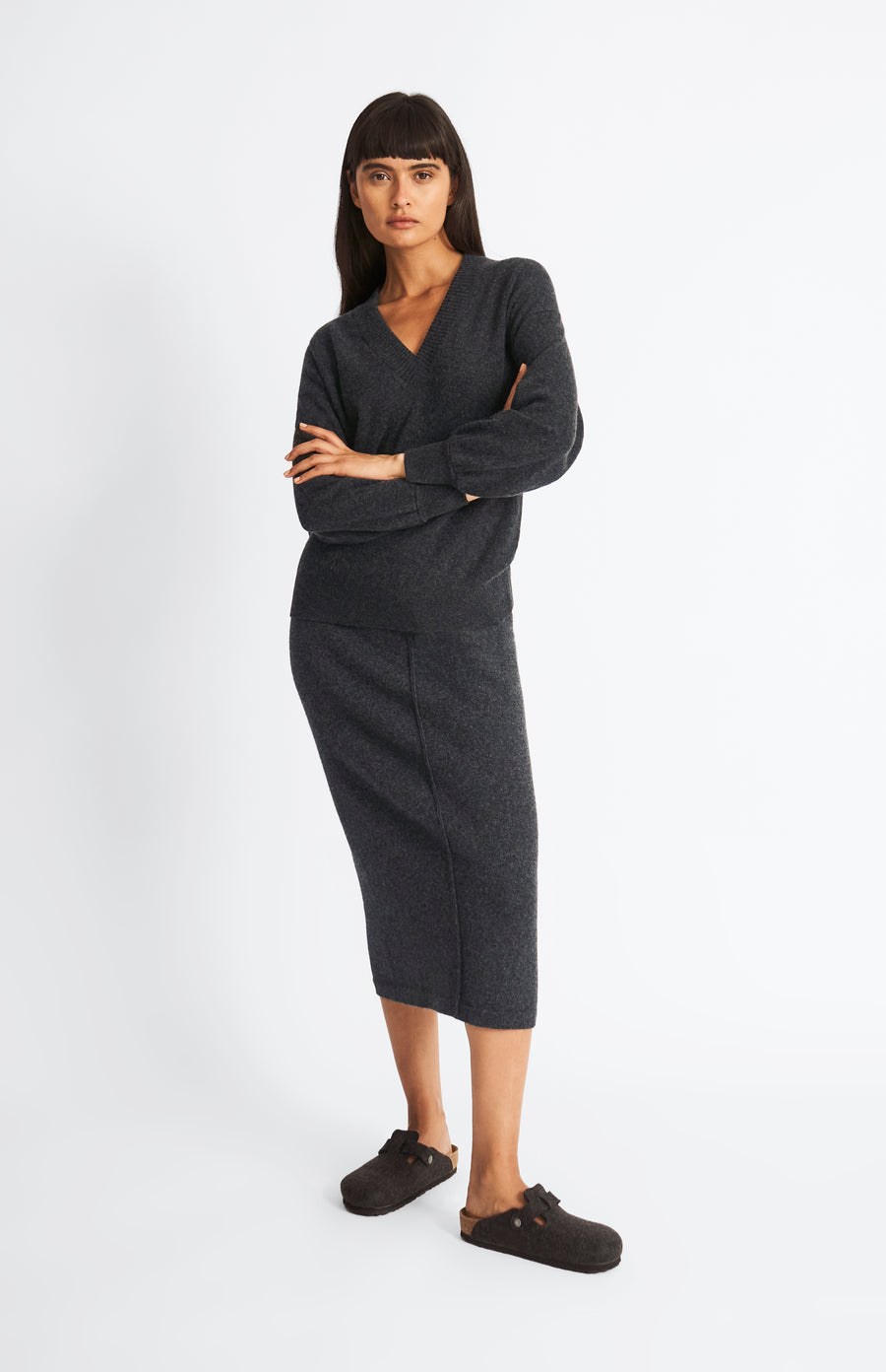 Pringle of Scotland Lightweight V Neck Cashmere Jumper In Charcoal on model with matching skirt