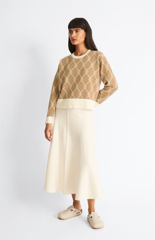 Pringle of Scotland Cashmere Blend Monogram Jumper in Camel / Cream on model with skirt