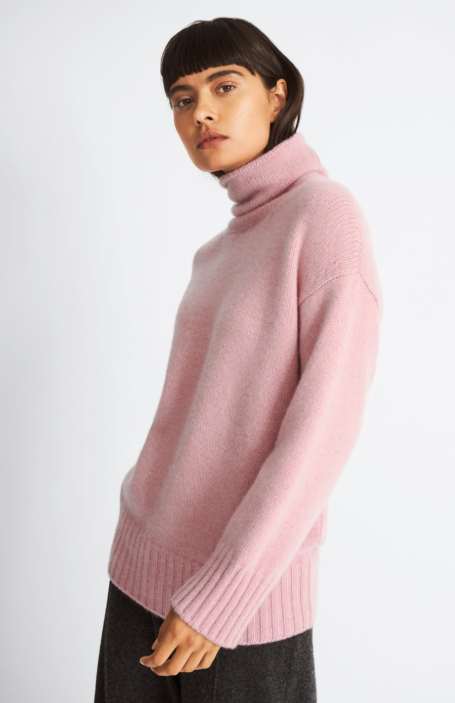 Pringle of Scotland High Neck Cosy Cashmere Jumper In Dusty Pink on model
