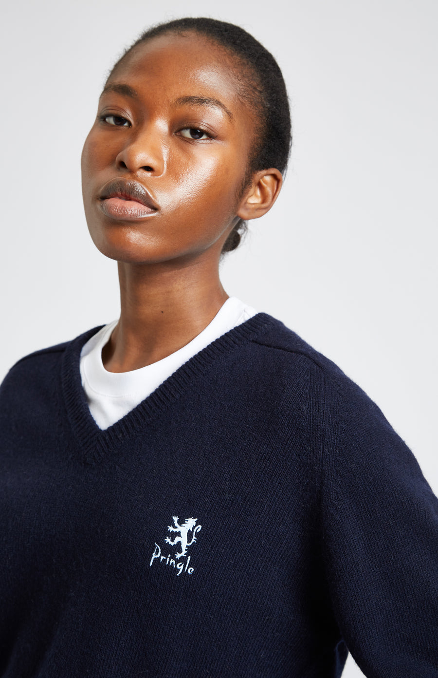 Pringle of Scotland Archive Women's V neck Lambswool Jumper In Navy showing embroidery