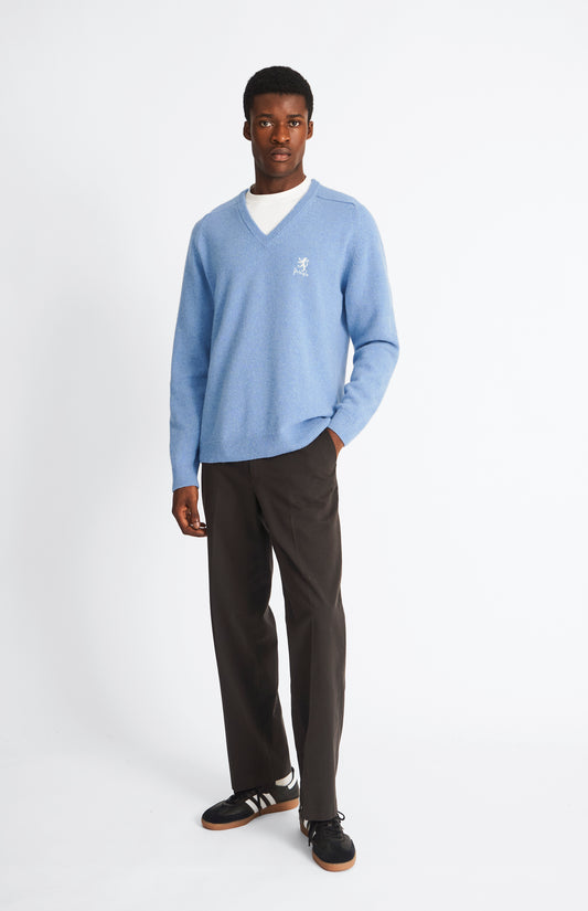 Pringle of Scotland Archive Men's V neck Lambswool Jumper In Carolina Blue on model full length