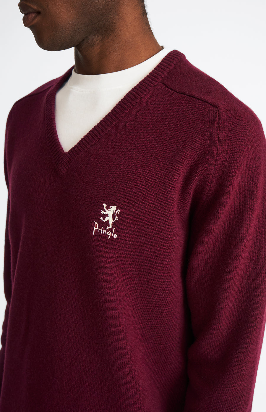 Pringle of Scotland Archive Men's V neck Lambswool Jumper In Claret showing embroidery