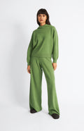 Pringle of Scotland Women's Cashmere Blend Hoodie In Wood Sage on model with matching trousers