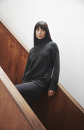 Pringle of Scotland High Neck Cosy Cashmere Jumper In Charcoal on model