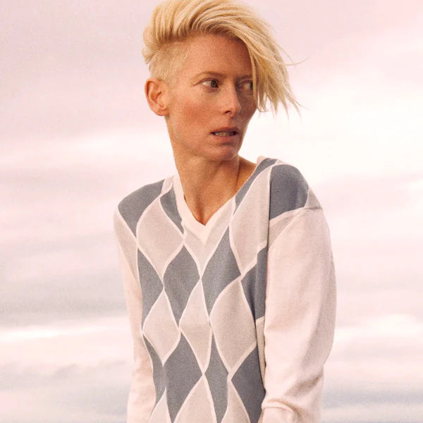 Tilda Swinton wearing a Pringle of Scotland cashmere Argyle jumper 