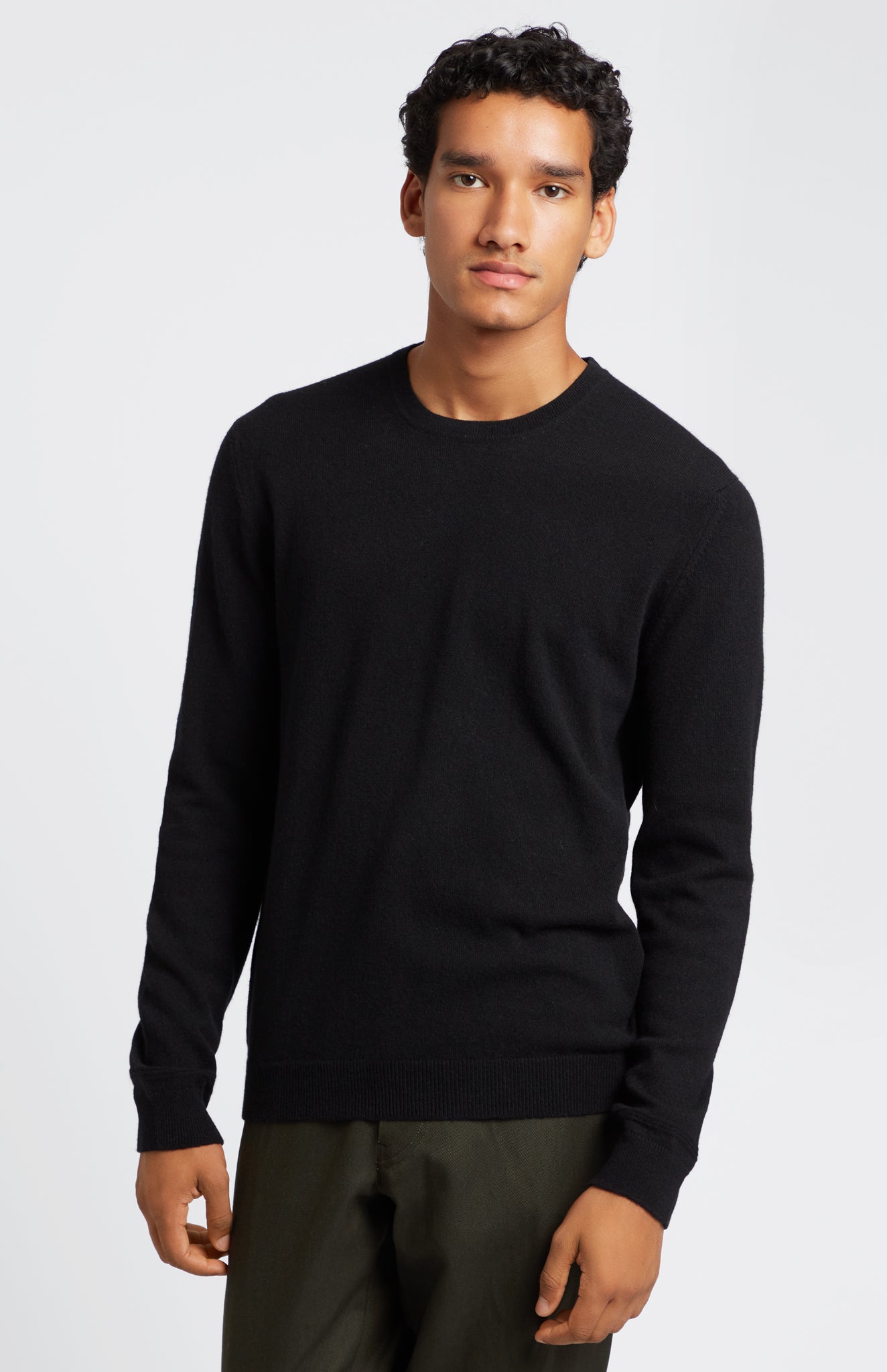 Men's Scottish Cashmere Round Neck Jumper In Black on model - Pringle of Scotland