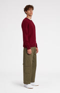 Round Neck Lion Lambswool Jumper In Burgundy side view - Pringle of Scotland