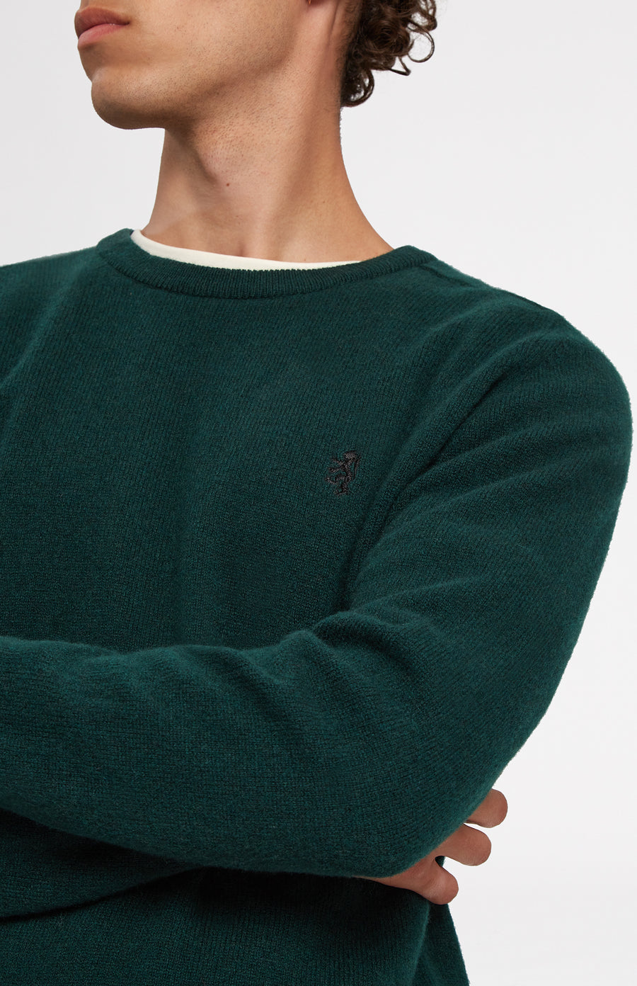Round Neck Lion Lambswool Jumper In Evergreen neck detail - Pringle of Scotland