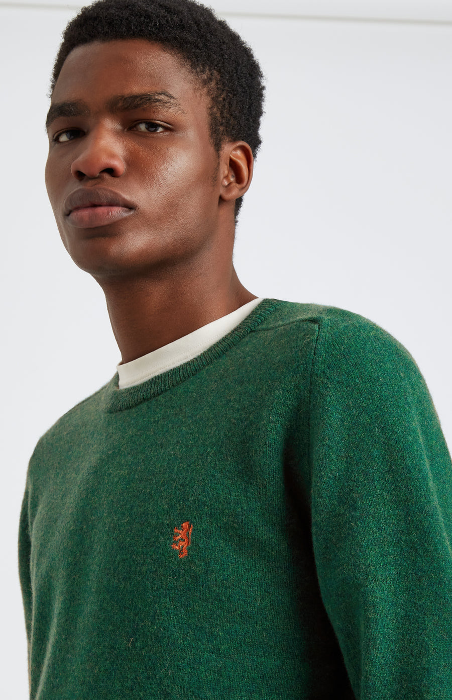 Pringle of Scotland Round Neck Lion Lambswool Jumper In Forest & Sandstorm embroidery detail
