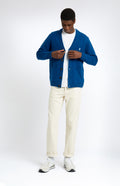 Pringle of Scotland Men's lambswool V Neck Cardigan in Ink & Azure being buttoned