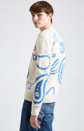 Paisley Lambswool Jumper in Chalk & Cobalt side view - Pringle of Scotland