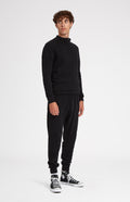 Men's Half Zip Merino Cashmere Jumper in Black on model full length - Pringle of Scotland