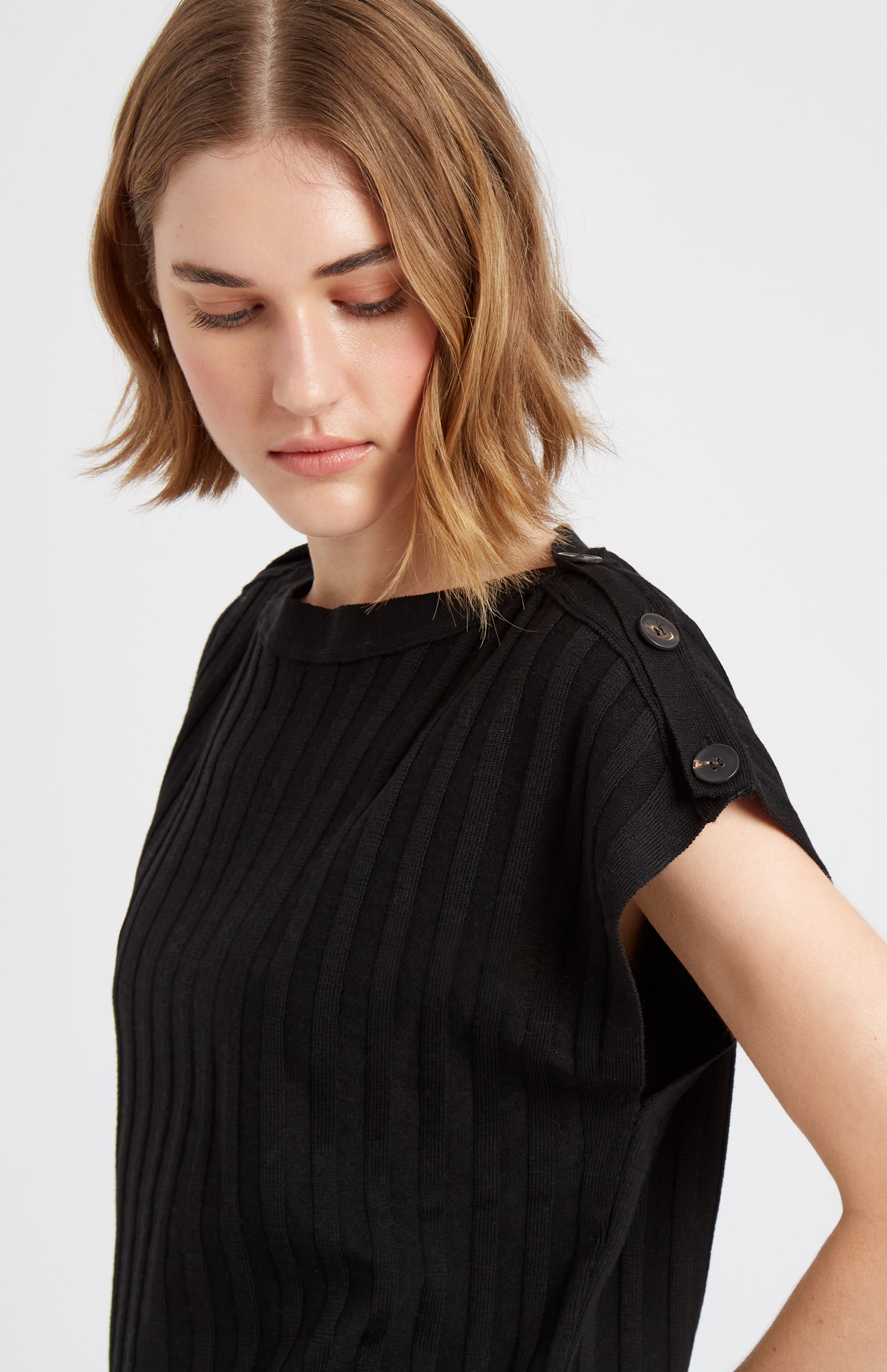 Pringle of Scotland Round Neck Merino Sleeveless Jumper In Black showing sleeve Milano stitch detail