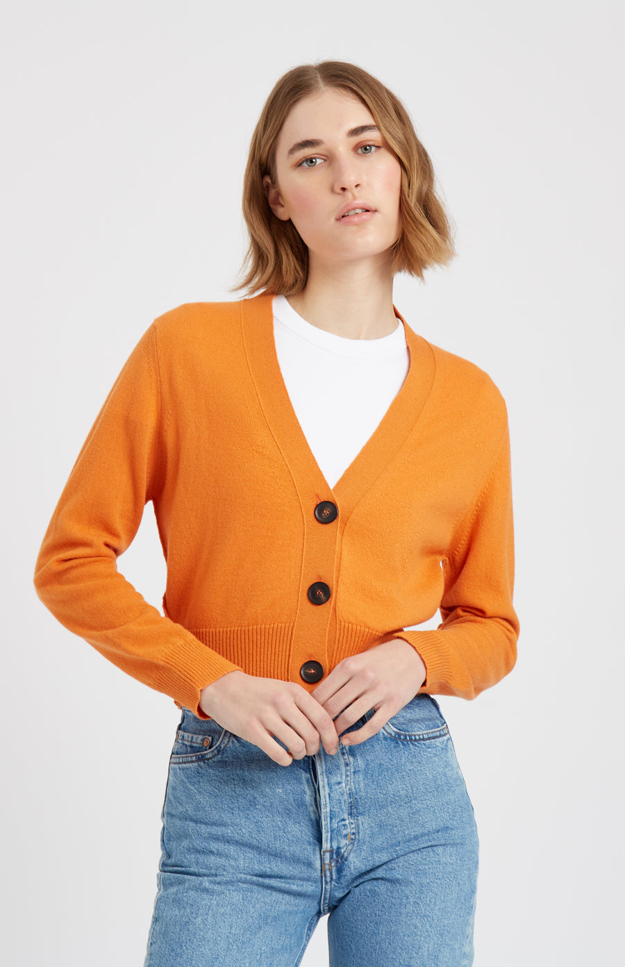 Pringle of Scotland Women's Cropped Cashmere Cardigan In Burnt Orange on model
