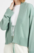 Pringle of Scotland Lightweight Cashmere Cardigan with Tie in Aniseed showing tie detail