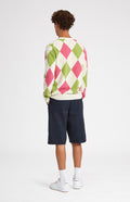 Heritage argyle golf jumper in Ivory & Heather on male model rear view  - Pringle of Scotland 