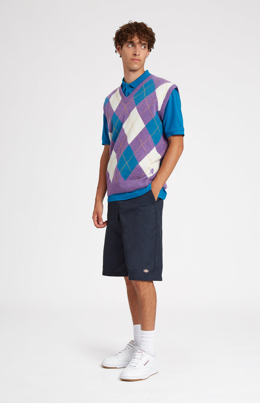 Heritage argyle golf sleeveless jumper in Purple & Ivory on mal;e model - Pringle of Scotland 