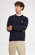 Round Neck Lambswool Golf Jumper In Navy on male model close up - Pringle of Scotland